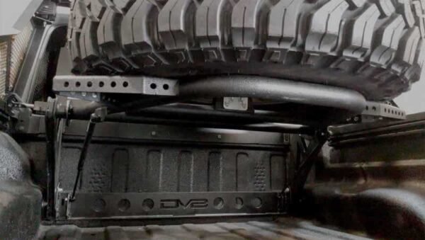 DV8 Offroad 2019+ Jeep Gladiator In-Bed Adjustable Tire Carrier - Image 4