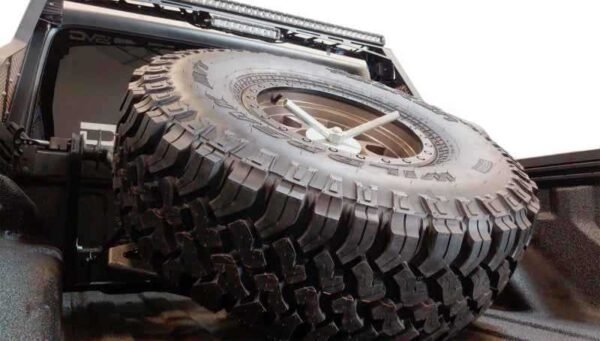 DV8 Offroad 2019+ Jeep Gladiator In-Bed Adjustable Tire Carrier - Image 7